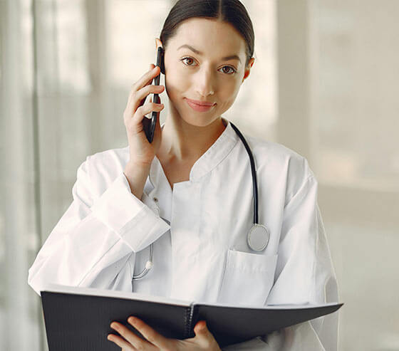A female doctor providing phone medical cannabis tele health consultation
